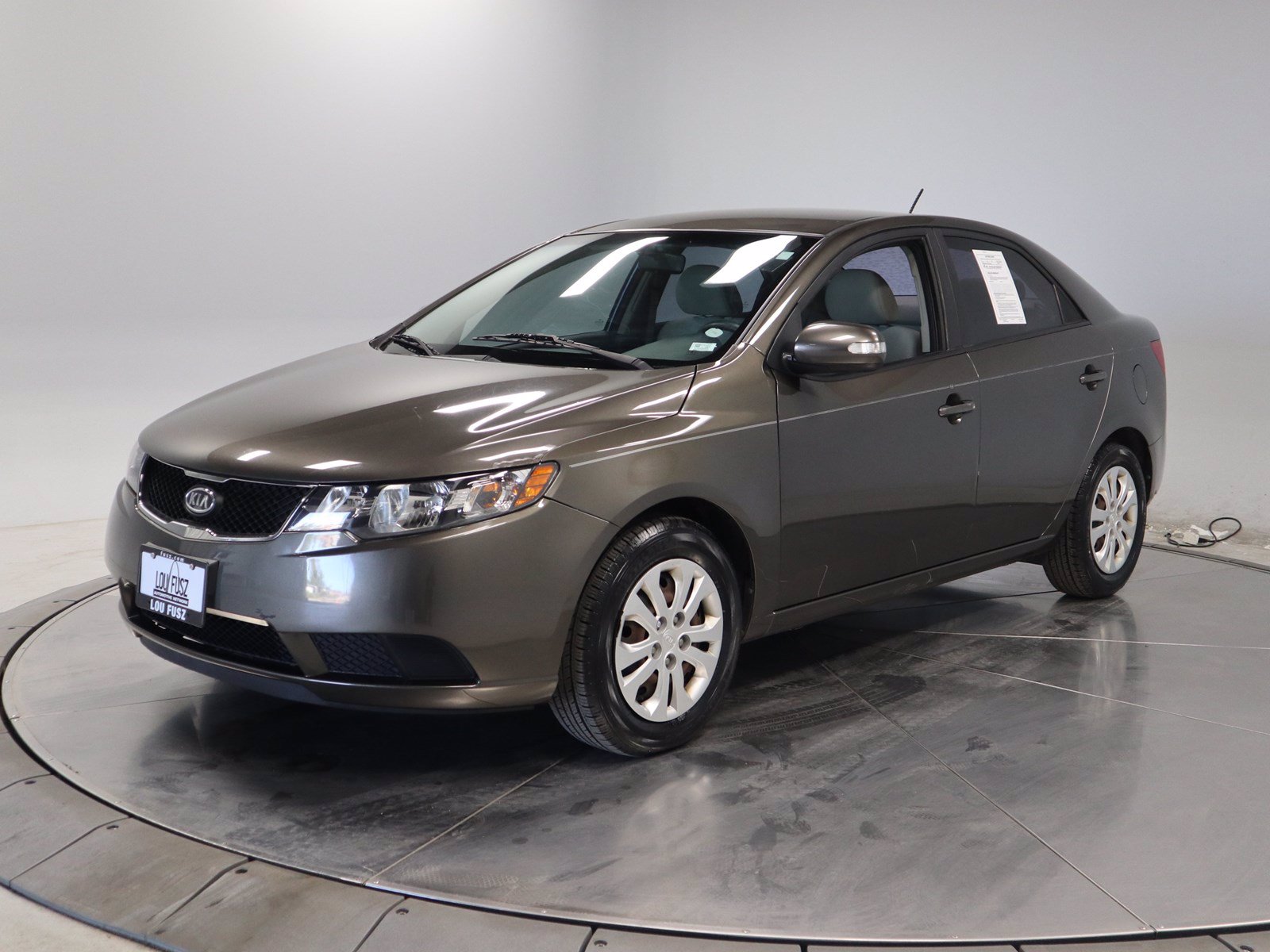 Pre-Owned 2010 Kia Forte EX FWD 4dr Car